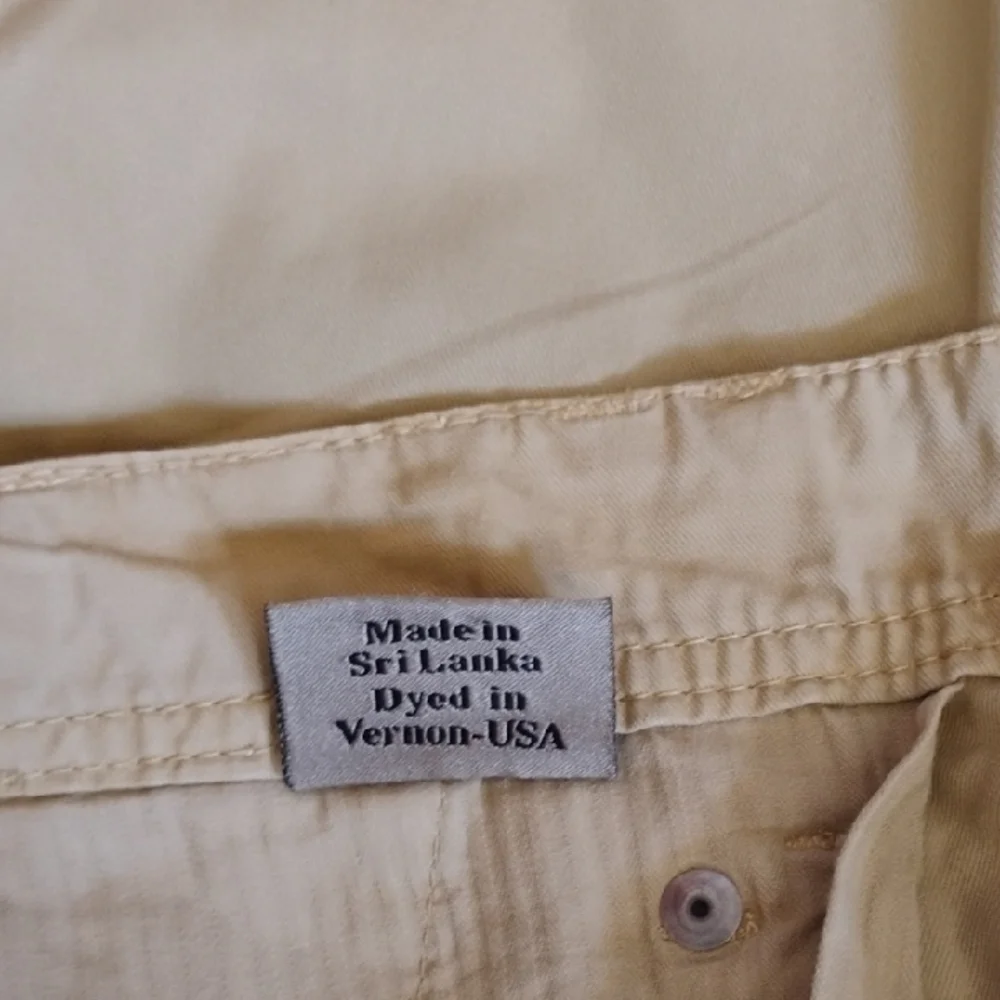Paperbacks Tan Flat Front Shorts